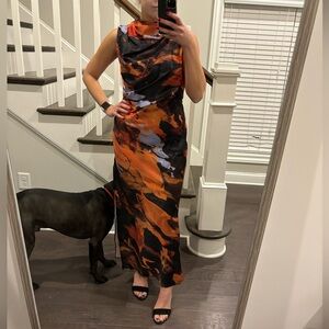 satin high neck drape maxi dress with open back and high split in abstract print